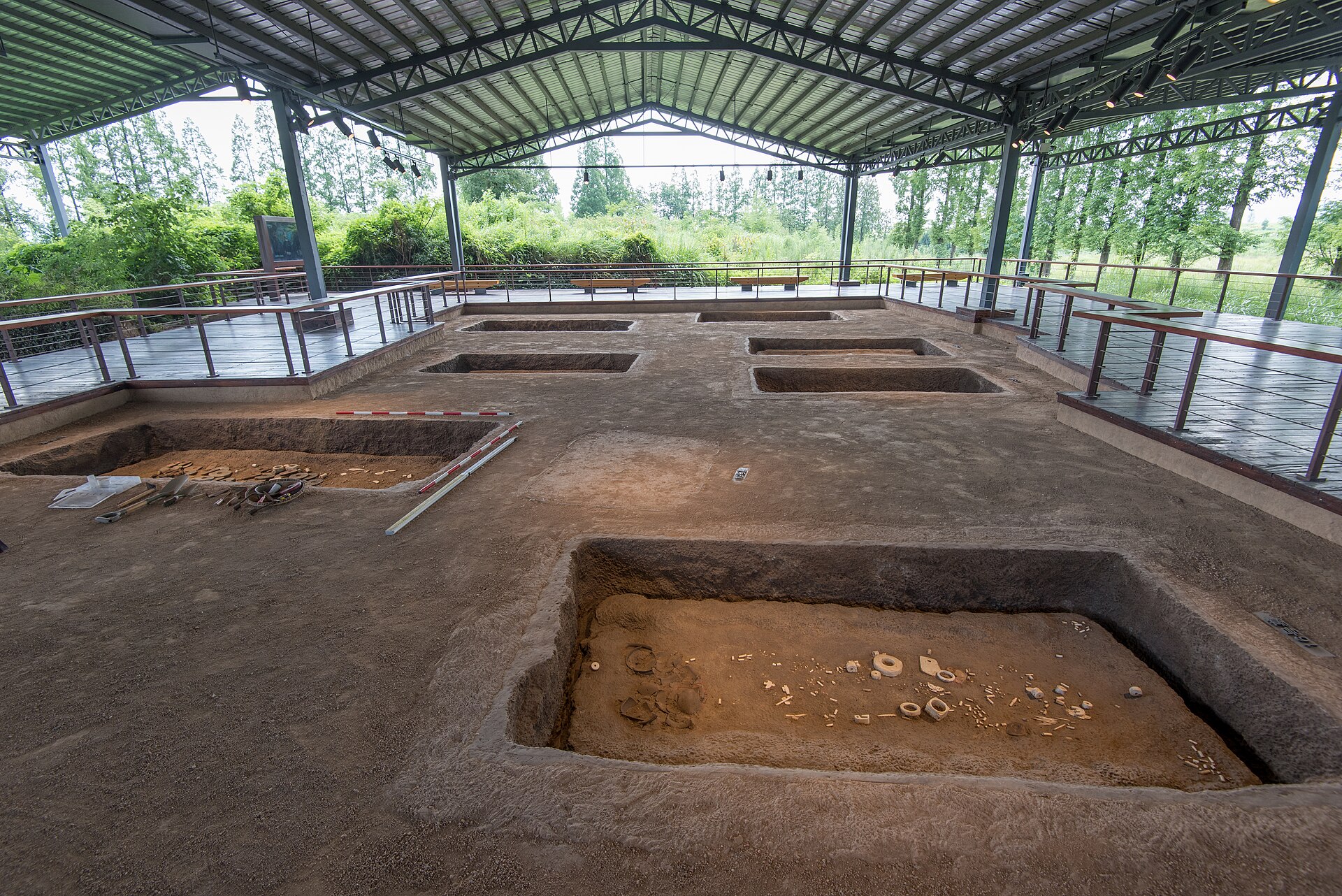 Outdoor reconstruction display of the Fanshan tomb area at the Liangzhu Archaeological Site park