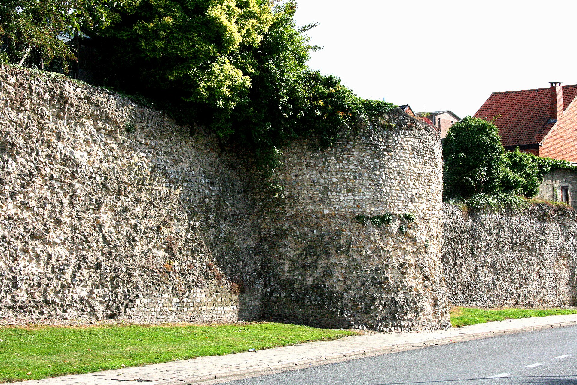 Stretch of ancient Roman stone wall in Tongeren, Belgium