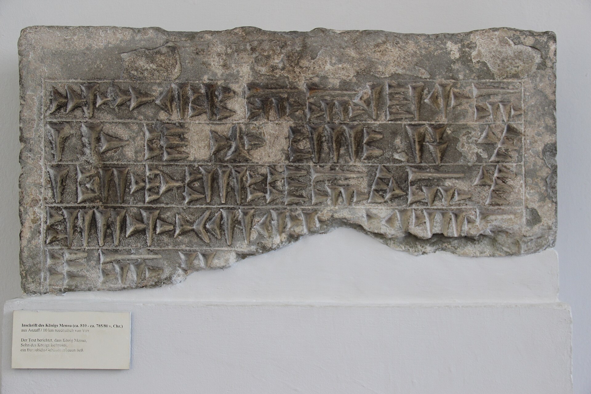 Stone block carved with rows of Urartian cuneiform signs from King Minua's reign